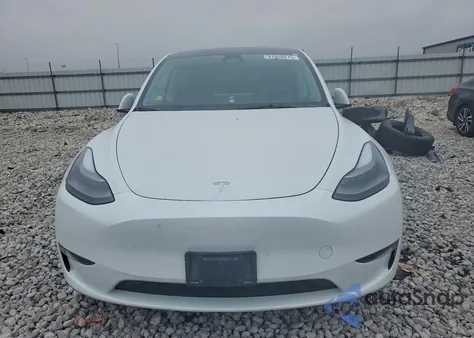 2023 Tesla Model Y from USA, damaged, VIN 7SAYGDEE9PF704187
